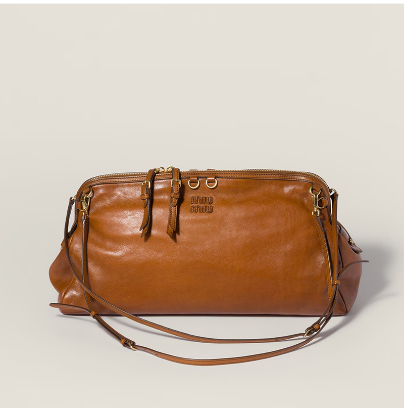 [특급스페셜오더]MIUMIU-5BF133 미우미우 카프리스 가죽 클러치 코냑